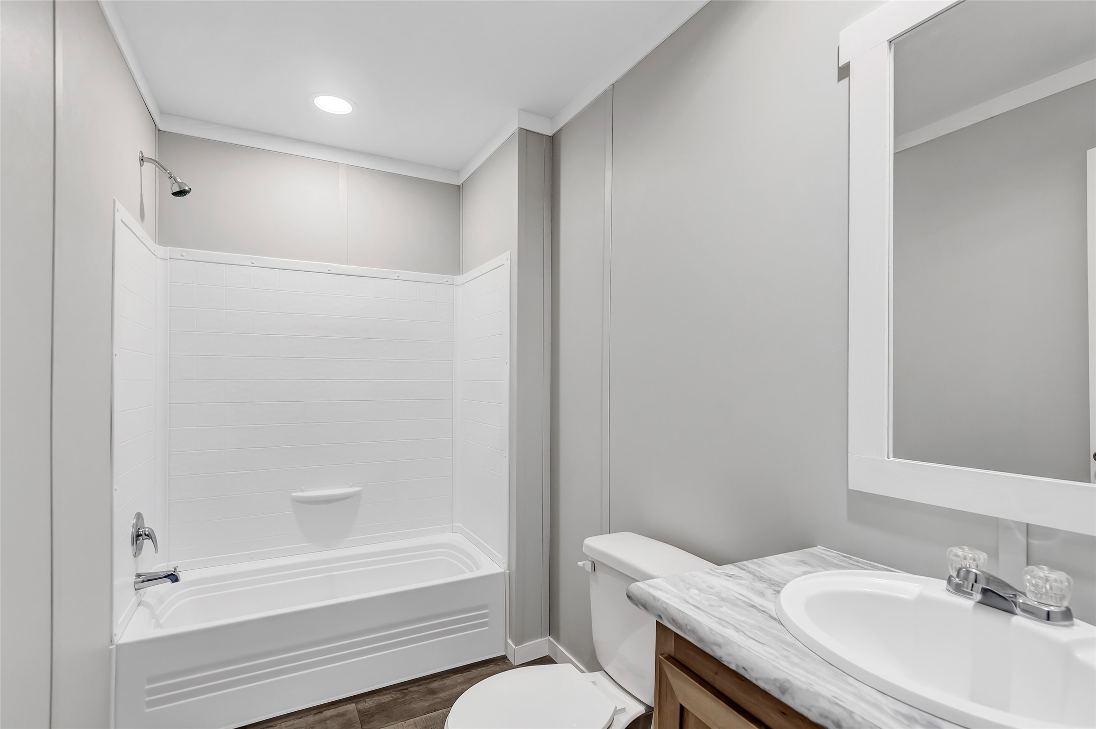 732 Lake Camelot Circle Ivanhoe, TX 75979 - Photo 13 of 18 a bathroom with a granite countertop sink toilet and shower