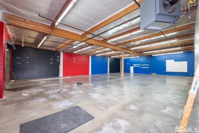 a view of a room with wooden walls