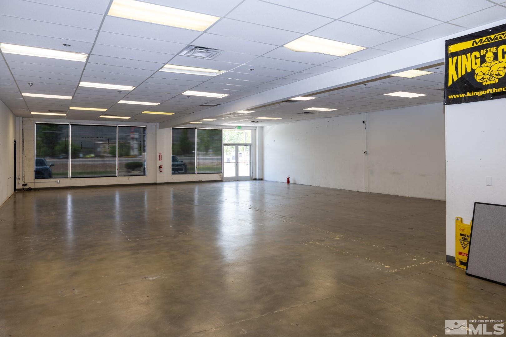 3727 North Carson Street, Unit 3727 Carson City, NV 89706 - Photo 27 of 29 a view of an empty room with wooden floor and a window