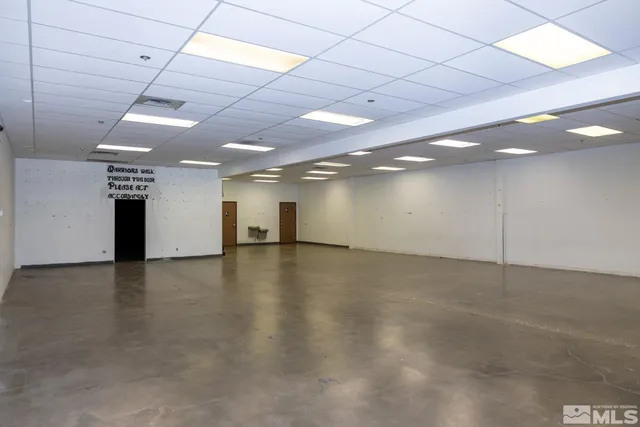 an empty room with a wooden floor