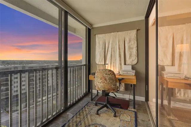 a bedroom with a bed and cabinets