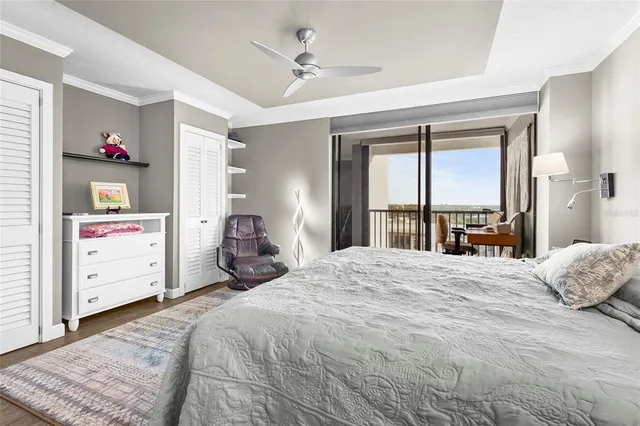 a bathroom with a white toilet and a shower curtain