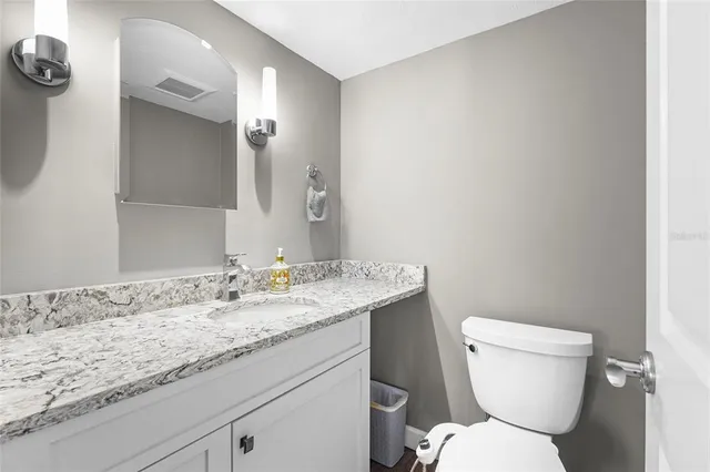 a house with a large pool in front of it