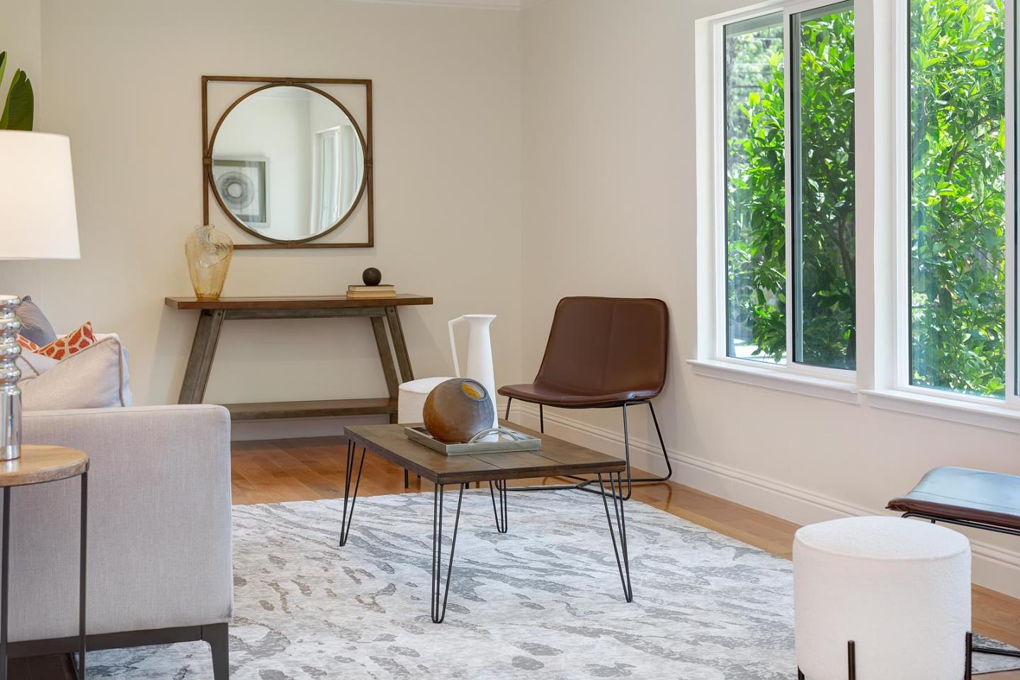 106 Springer Road Los Altos, CA 94024 - Photo 12 of 52 a living room with a chair and a window