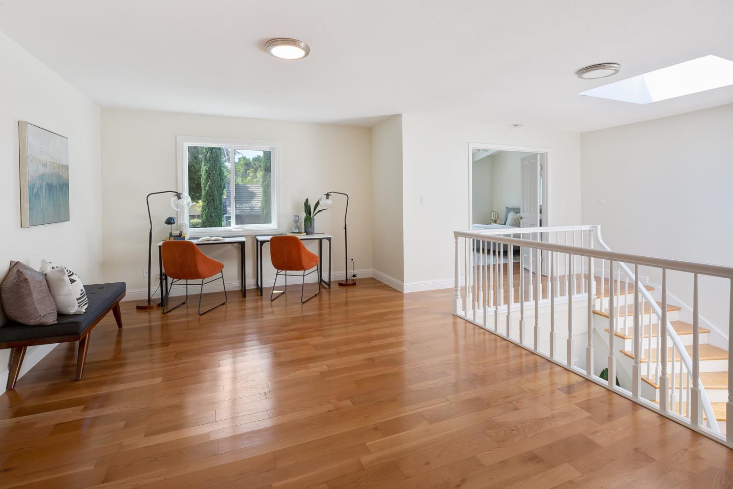106 Springer Road Los Altos, CA 94024 - Photo 18 of 52 a dining room with furniture a chandelier and wooden floor