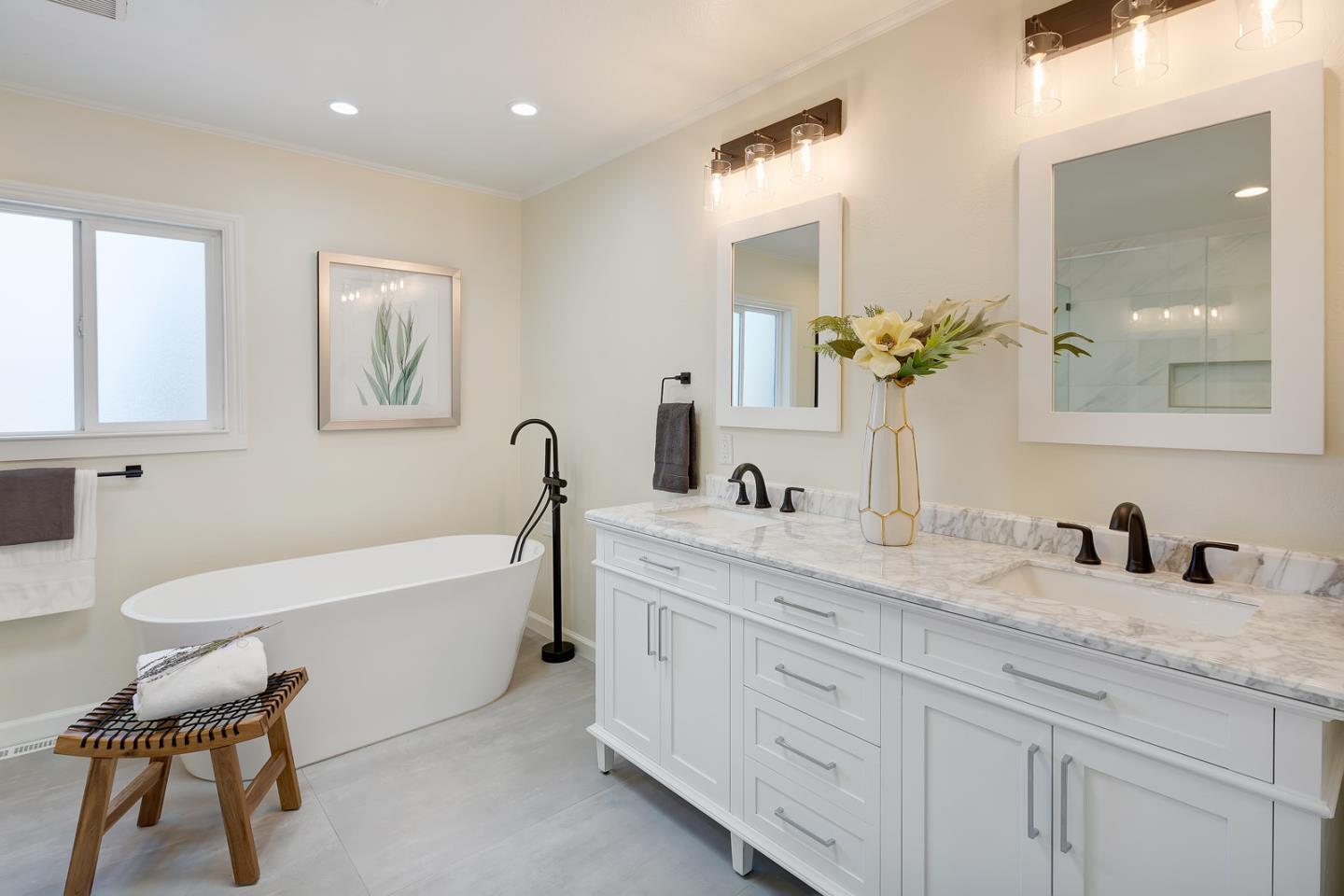 106 Springer Road Los Altos, CA 94024 - Photo 23 of 52 a bathroom with a granite countertop sink and a mirror