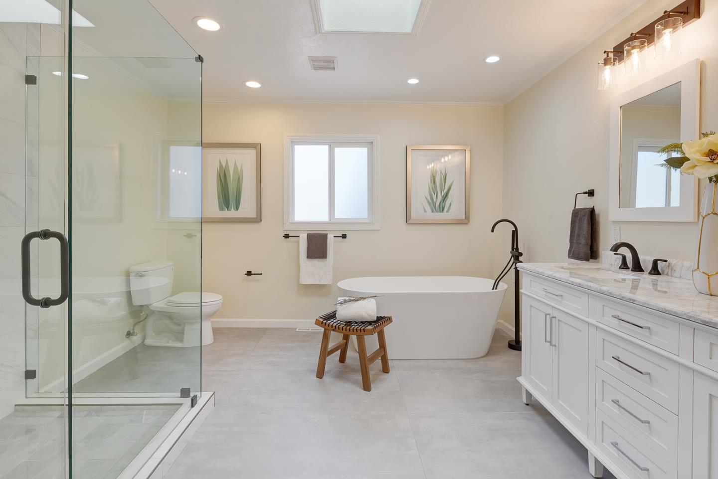 106 Springer Road Los Altos, CA 94024 - Photo 25 of 52 a bathroom with a granite countertop sink a toilet and bathtub