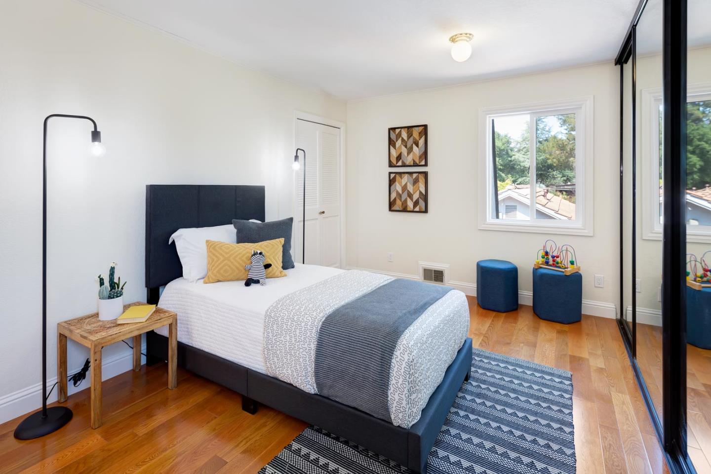 106 Springer Road Los Altos, CA 94024 - Photo 27 of 52 a bedroom with bed and window