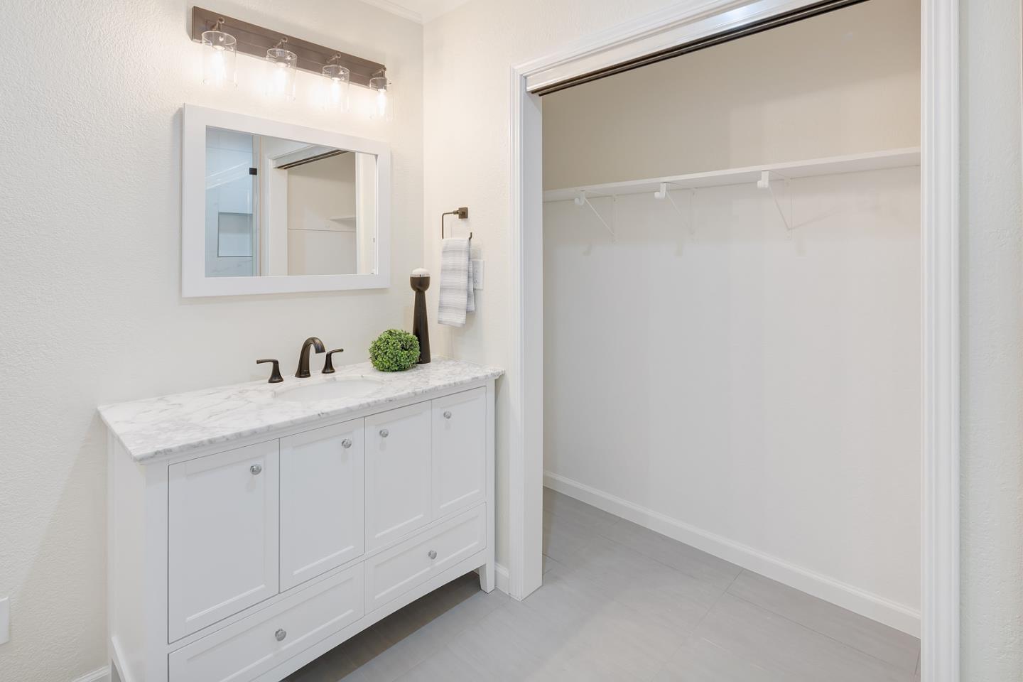 106 Springer Road Los Altos, CA 94024 - Photo 32 of 52 a bathroom with a sink and a mirror