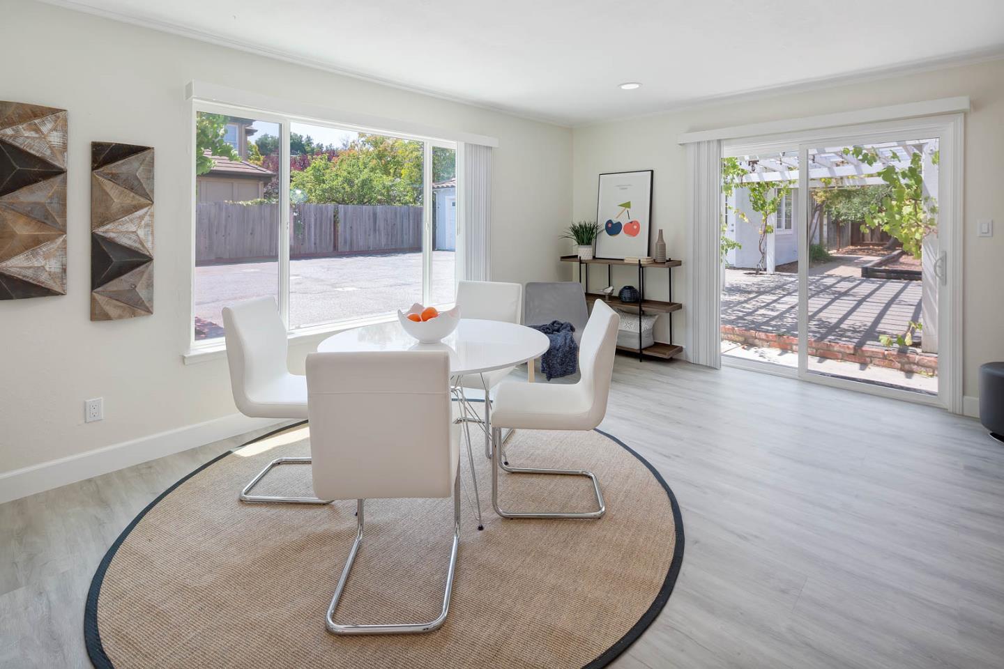 106 Springer Road Los Altos, CA 94024 - Photo 37 of 52 a living room with furniture and a large window