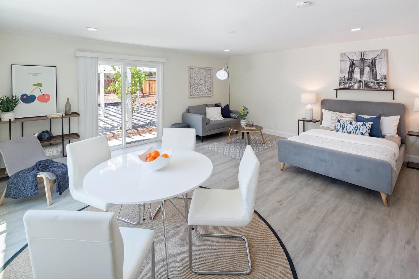 106 Springer Road Los Altos, CA 94024 - Photo 40 of 52 a living room with furniture and a table