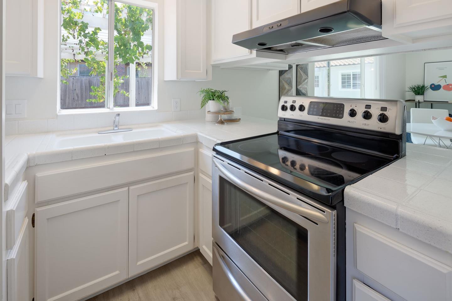 106 Springer Road Los Altos, CA 94024 - Photo 41 of 52 a kitchen with a stove and a sink
