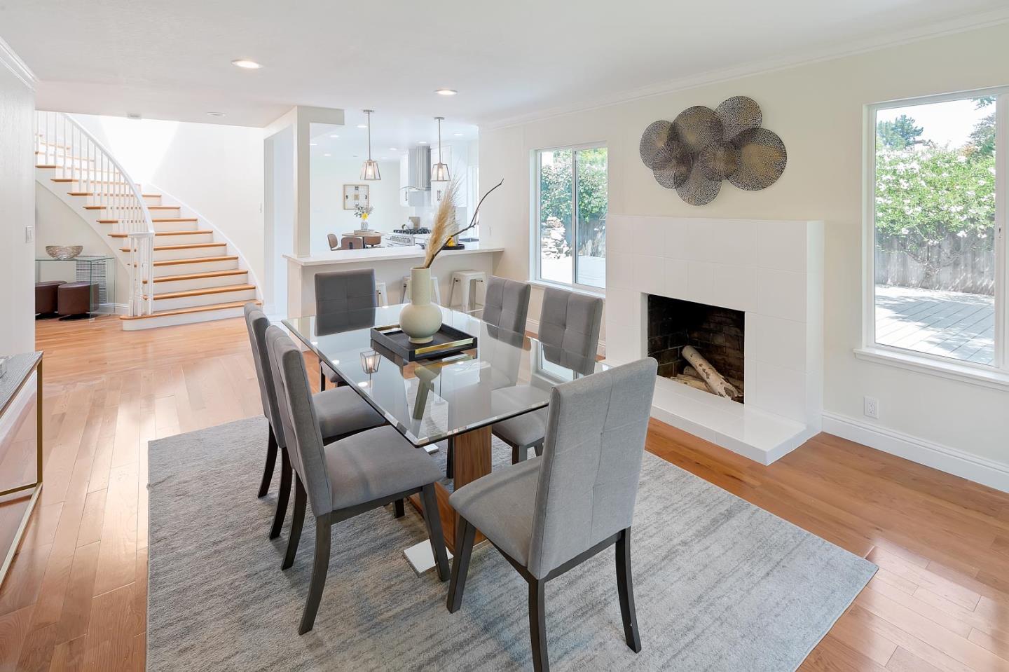 106 Springer Road Los Altos, CA 94024 - Photo 7 of 52 a view of a dining room with furniture window and wooden floor