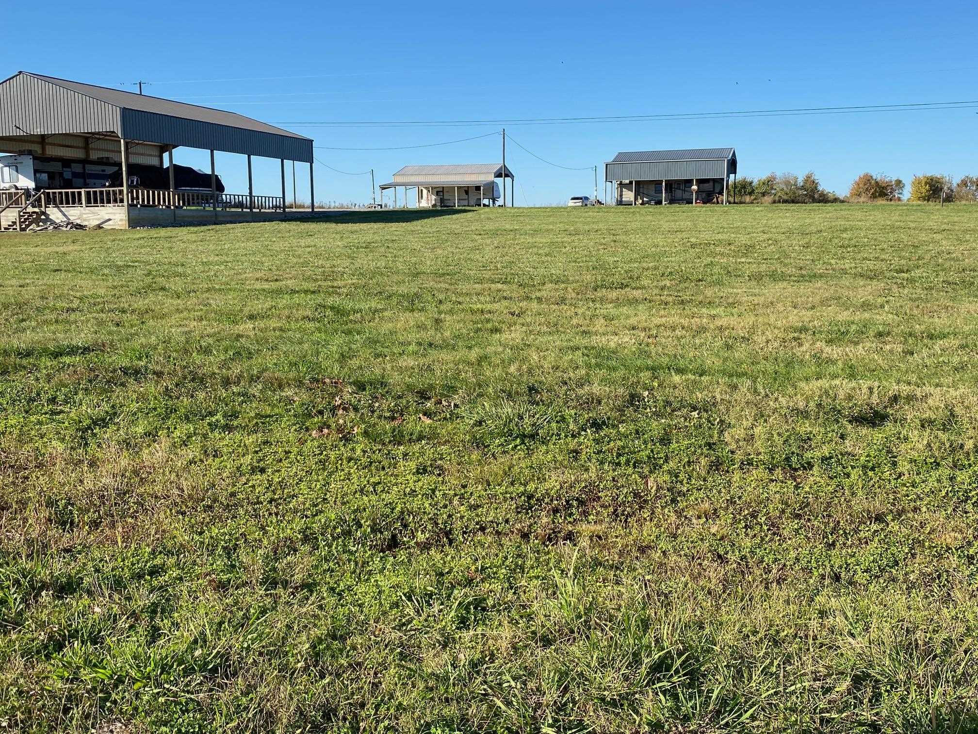 125 Catfish Lane Crump, TN 38327 - Photo 7 of 9 a view of building with yard
