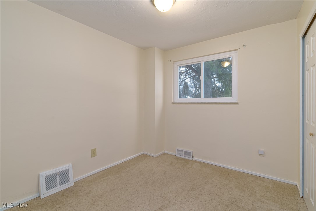 3165 East Sprague Road Independence, OH 44131 - Photo 17 of 41 2nd photo of bedroom with carpet and new window