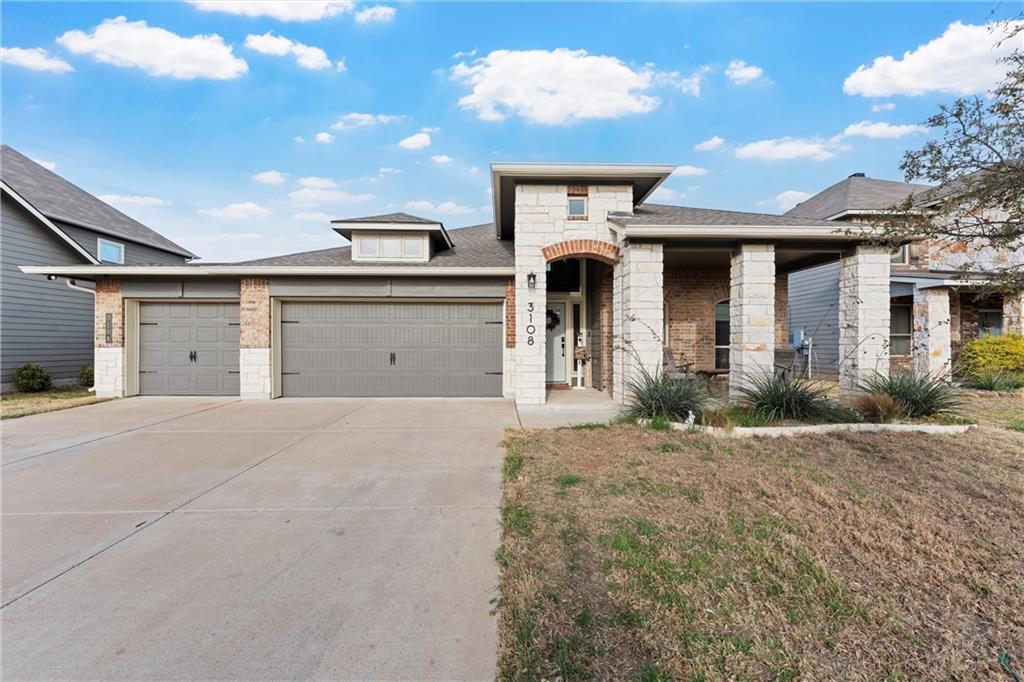 a view of a house with a garage