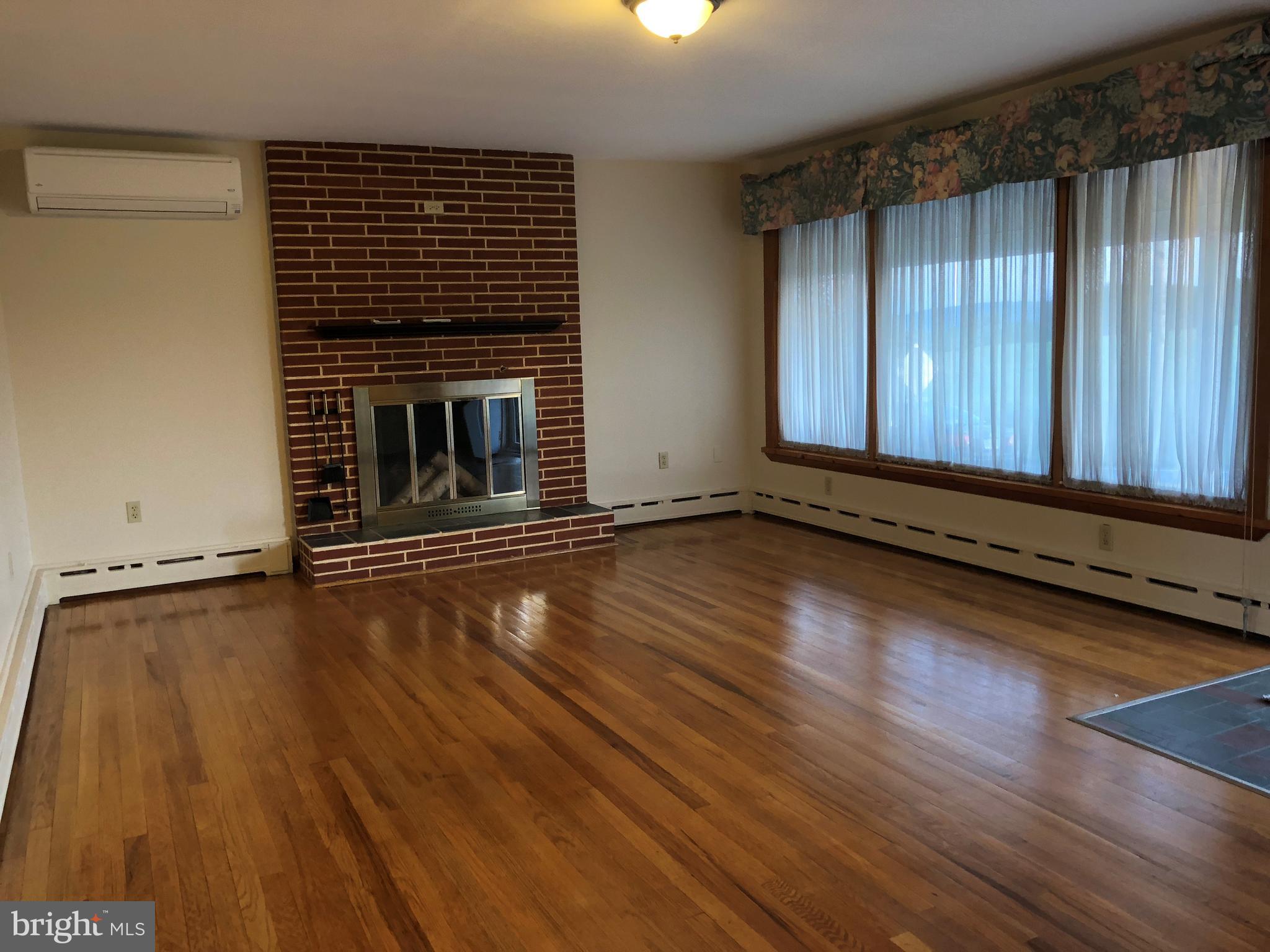 1954 Oberlin Road Harrisburg, PA 17111 - Photo 8 of 16 Living Room with Fireplace