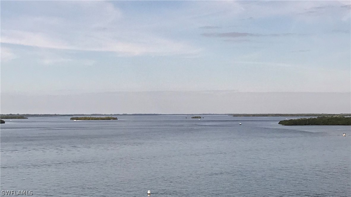 15021 Punta Rassa Road, Unit 704 Fort Myers, FL 33908 - Photo 16 of 18 a view of an ocean beach and beach