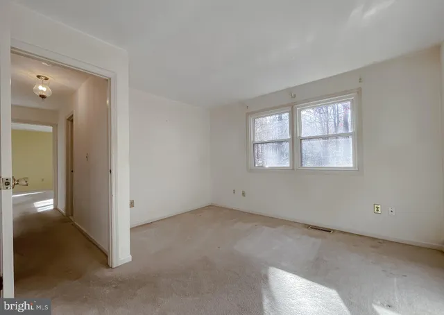 an empty room with windows