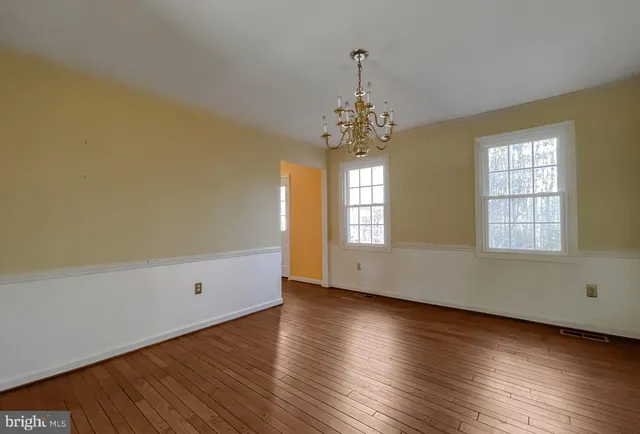 a kitchen with stainless steel appliances granite countertop a refrigerator sink and cabinets