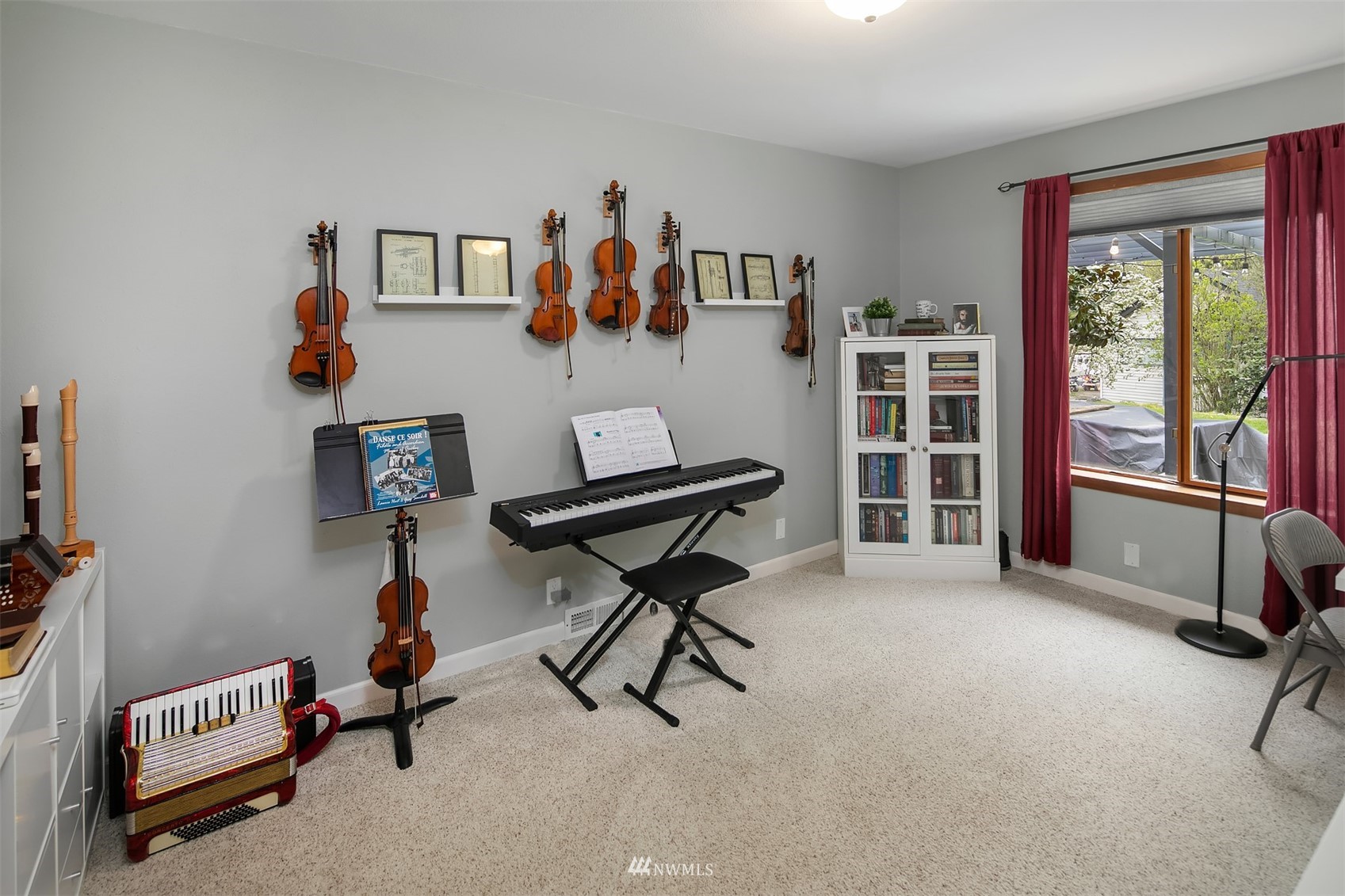 19108 Waxen Road Bothell, WA 98012 - Photo 23 of 31 a living room with furniture and a window