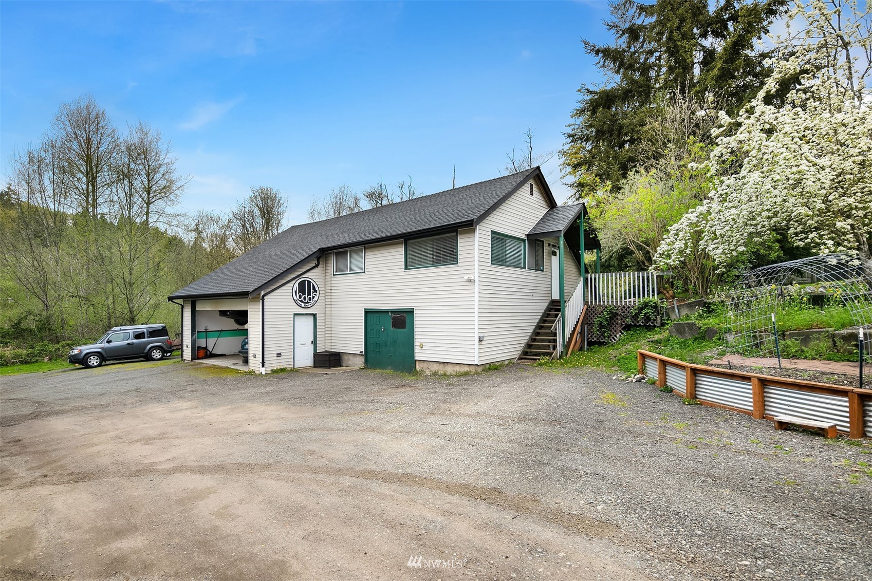 19108 Waxen Road Bothell, WA 98012 - Photo 27 of 31 a view of a house with backyard