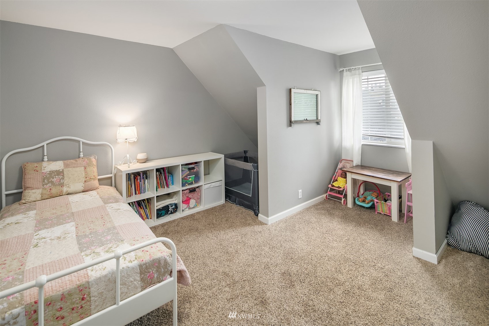 19108 Waxen Road Bothell, WA 98012 - Photo 9 of 31 a room with a bed and a tv