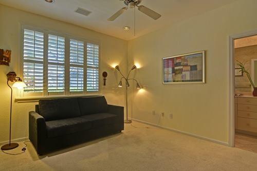 5156 Northwest 26th Circle Boca Raton, FL 33496 - Photo 9 of 18 a living room with furniture and a window