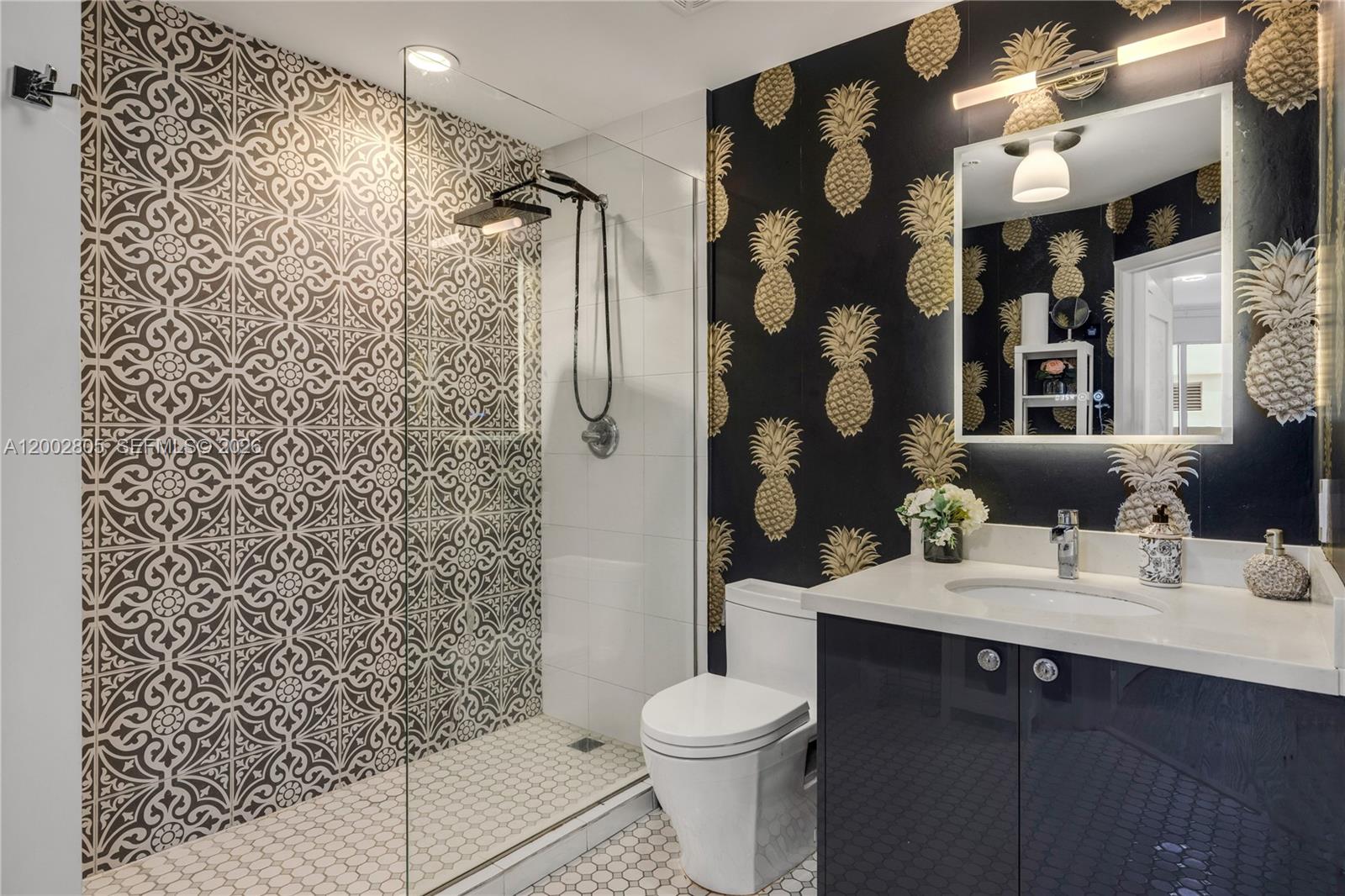 60 Southwest 13th Street, Unit 1124 Miami, FL 33130 - Photo 14 of 30 a bathroom with a sink toilet and shower