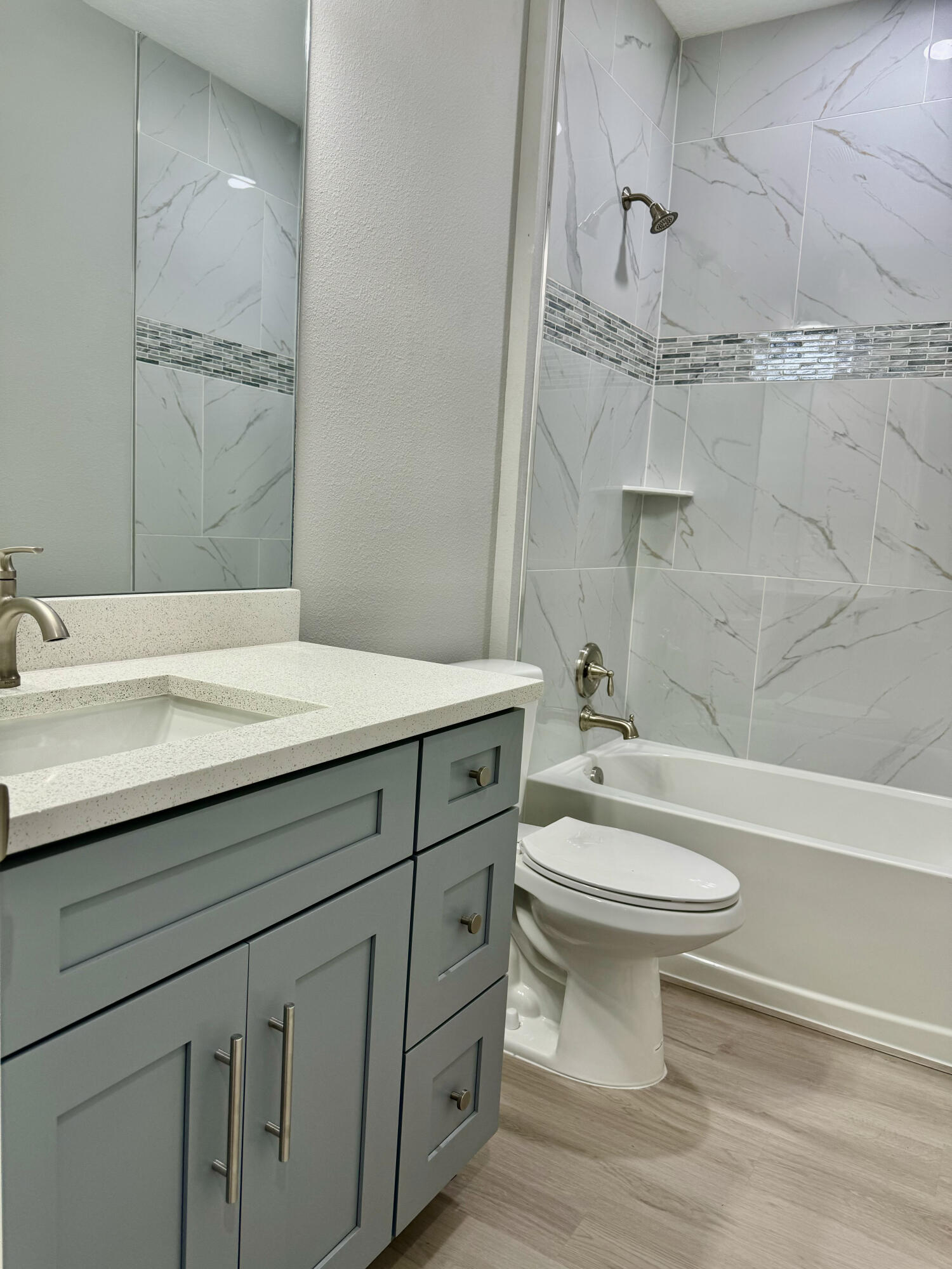 581 Southeast 36th Terrace Okeechobee, FL 34974 - Photo 11 of 19 a bathroom with a sink a toilet and shower