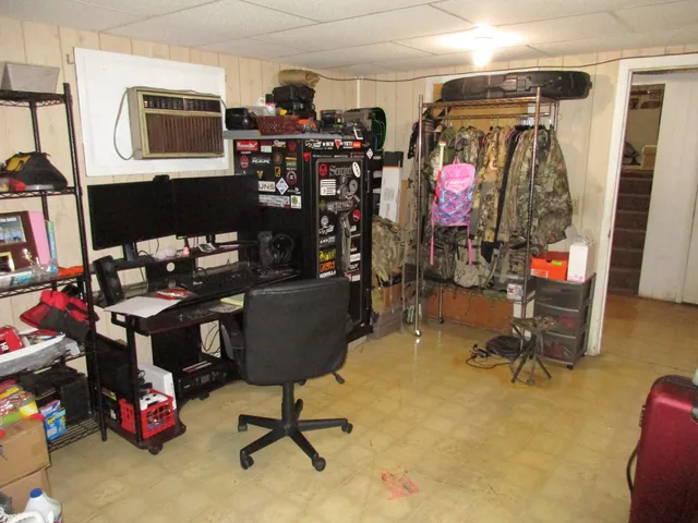 a view of a workspace with furniture