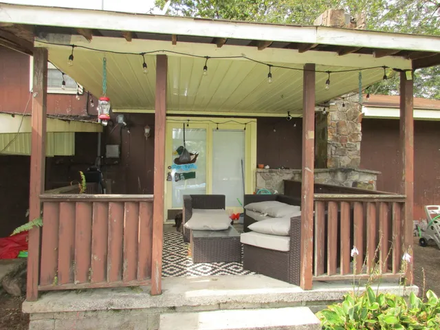 a view of living room kitchen and furniture