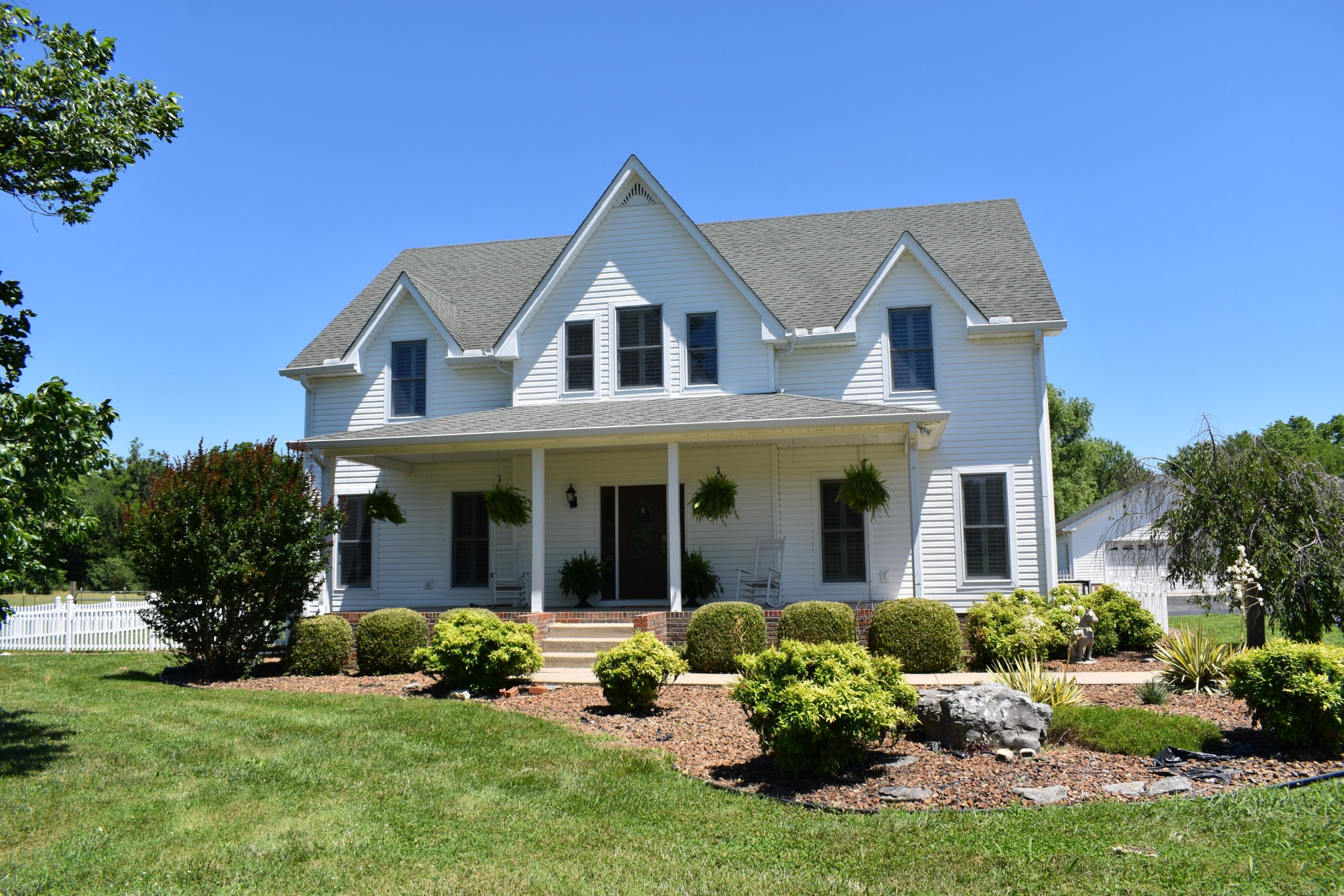 671 Chicken Road Lebanon, TN 37090 - Photo 40 of 46 front view of a house with a yard