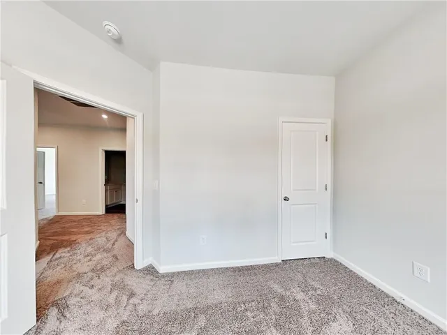 an empty room with closet