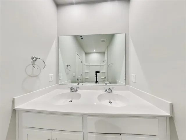 a bathroom with a shower and bathtub