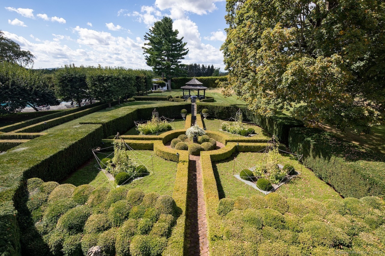406 Wells Hill Road Salisbury, CT 06039 - Photo 11 of 38 a view of a swimming pool with a patio