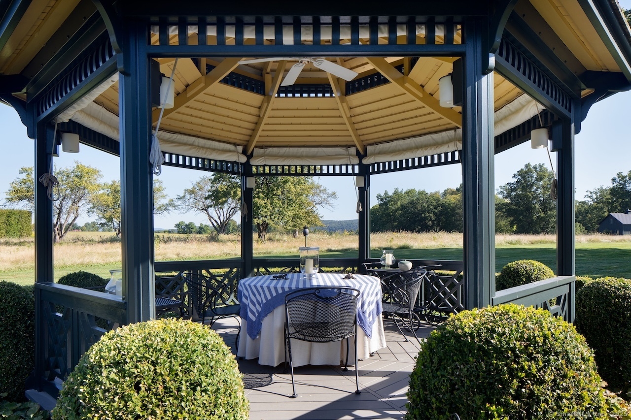 406 Wells Hill Road Salisbury, CT 06039 - Photo 12 of 38 a bedroom with furniture and a large window