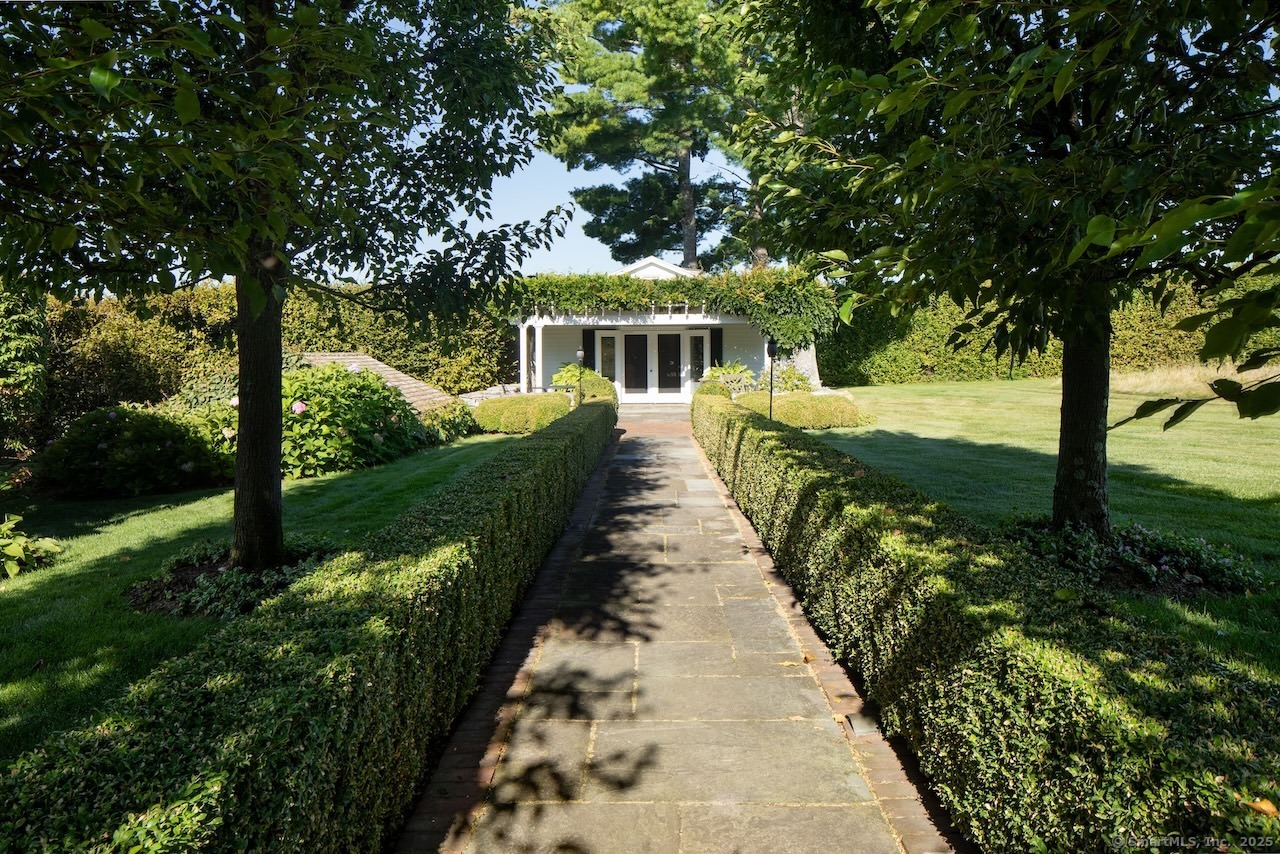 406 Wells Hill Road Salisbury, CT 06039 - Photo 13 of 38 a front view of a house with a yard