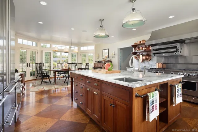 a kitchen with lots of counter top space and living room