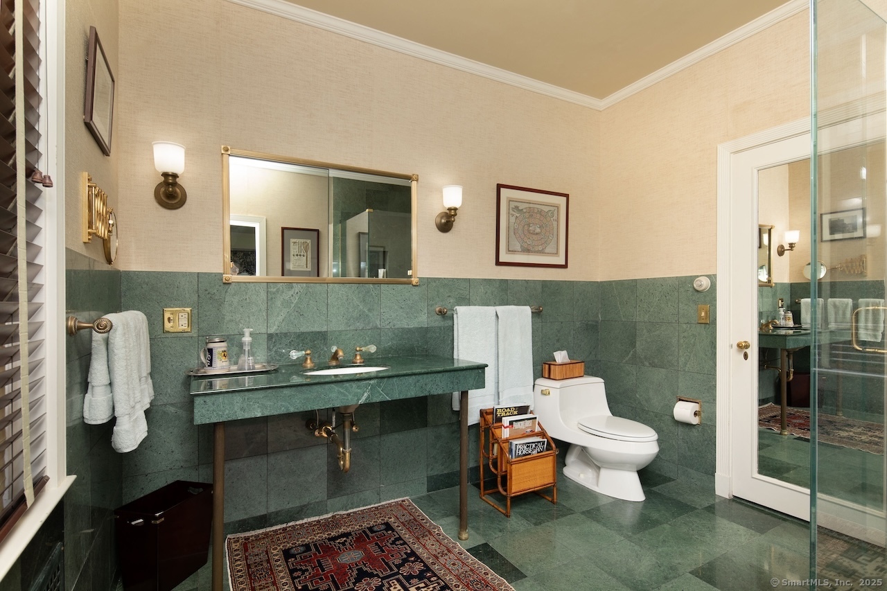 406 Wells Hill Road Salisbury, CT 06039 - Photo 26 of 38 a bathroom with a sink and a mirror