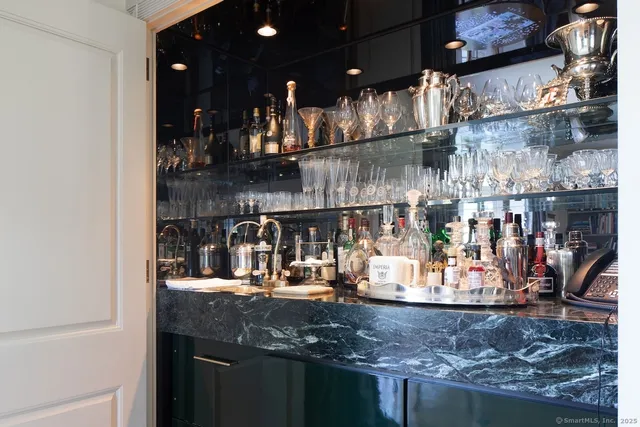 a kitchen with lots of counter top space and cabinets