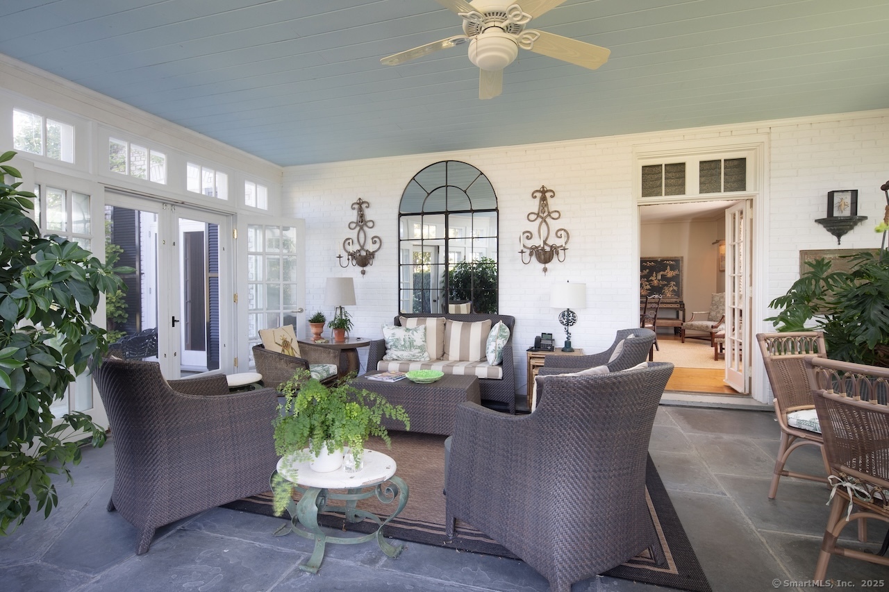 406 Wells Hill Road Salisbury, CT 06039 - Photo 9 of 38 a living room with fireplace furniture and a potted plant