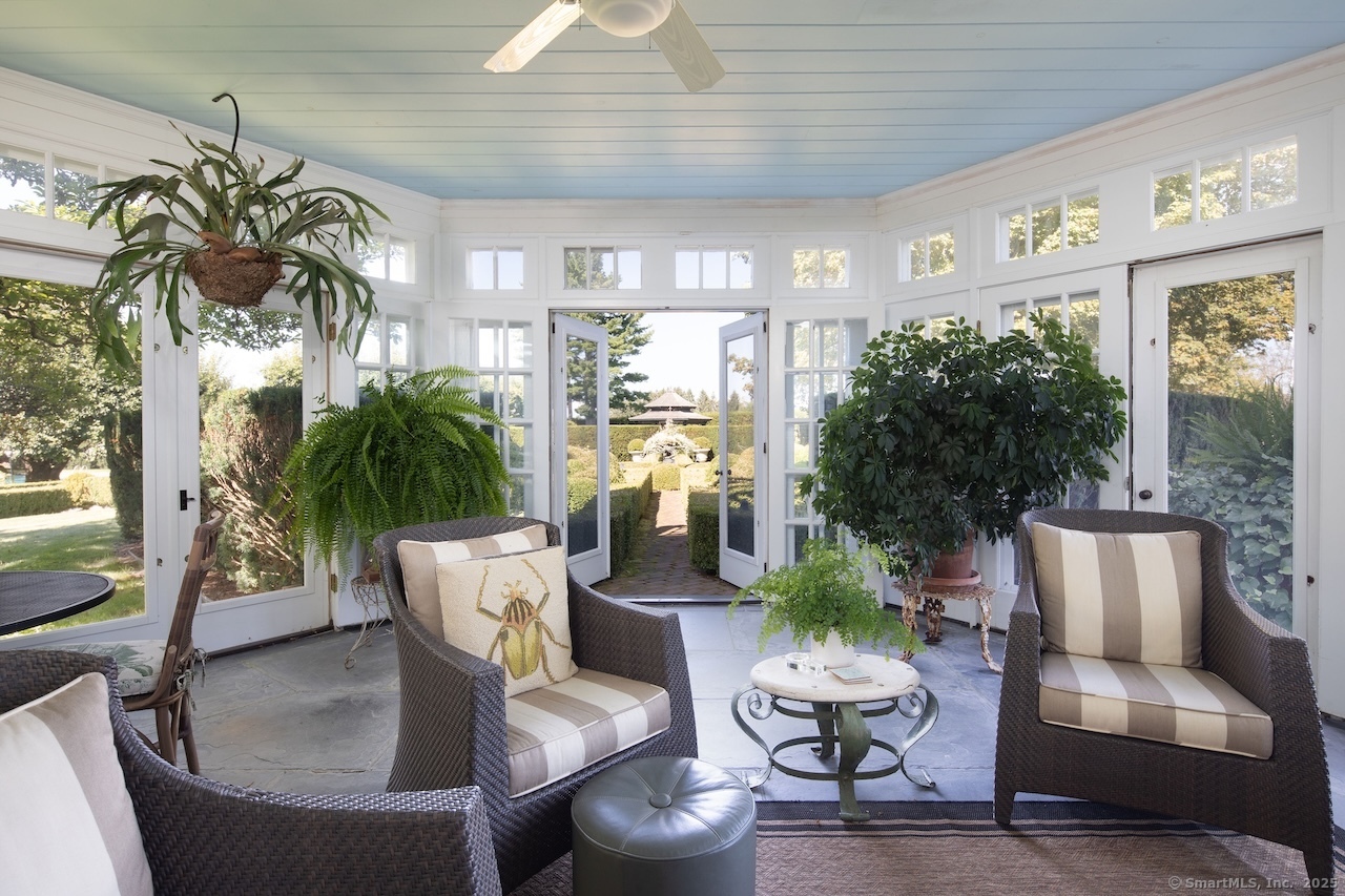406 Wells Hill Road Salisbury, CT 06039 - Photo 10 of 38 a living room with furniture and a large window