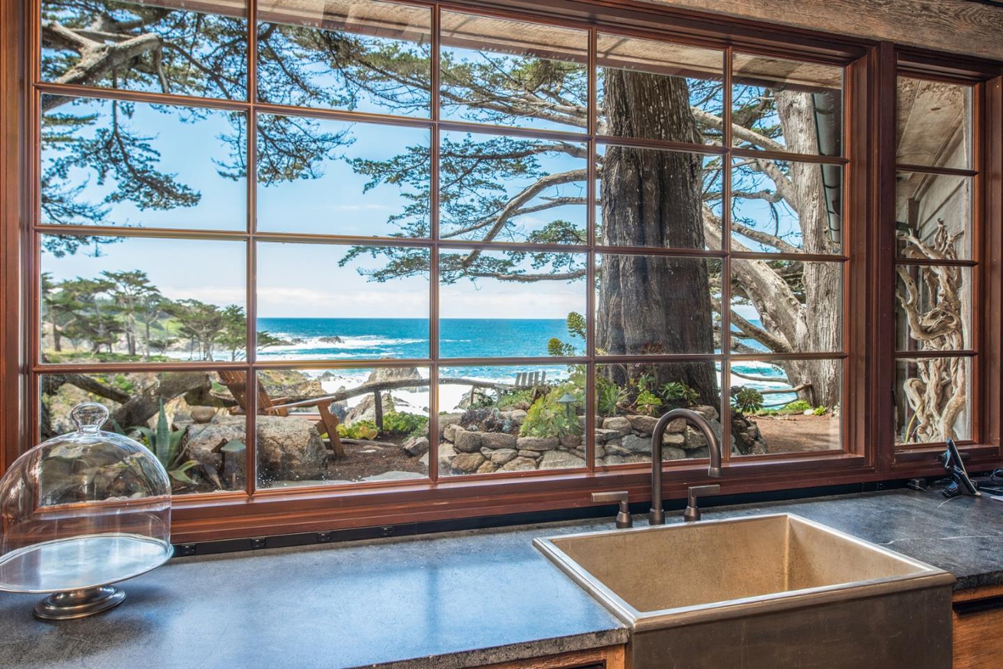 157-163 Spindrift Road Carmel, CA 93923 - Photo 34 of 100 a room with a large window and couch