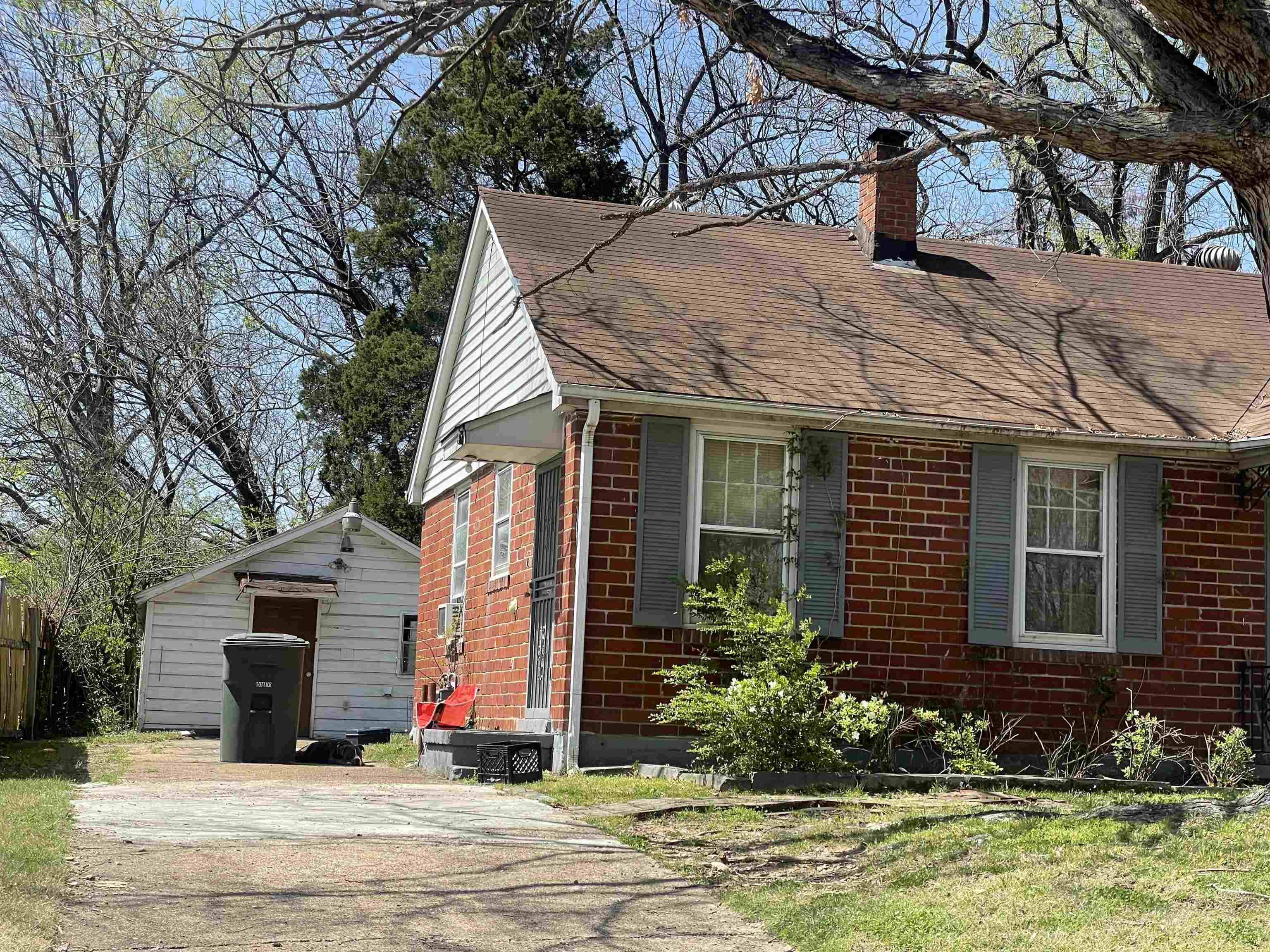 1311 Prescott Road Memphis, TN 38111 - Photo 2 of 4 a view of a house with a yard and tree s