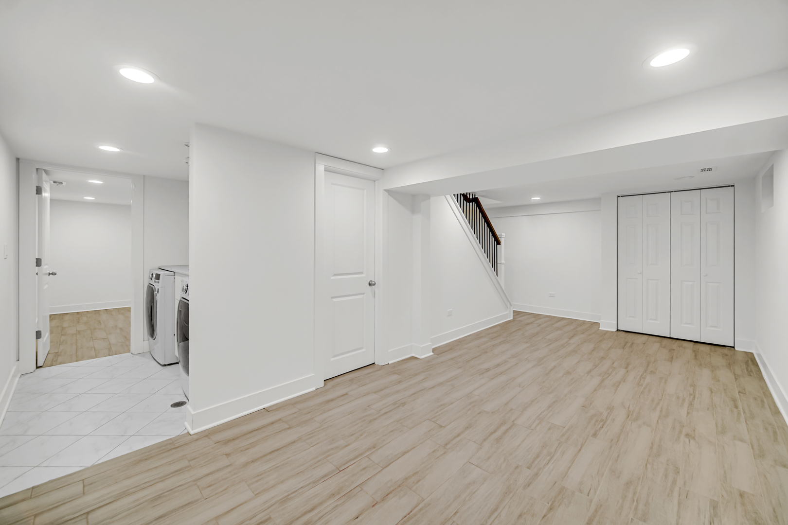 5817 Crain Street Morton Grove, IL 60053 - Photo 18 of 20 a view of empty room with wooden floor and fan