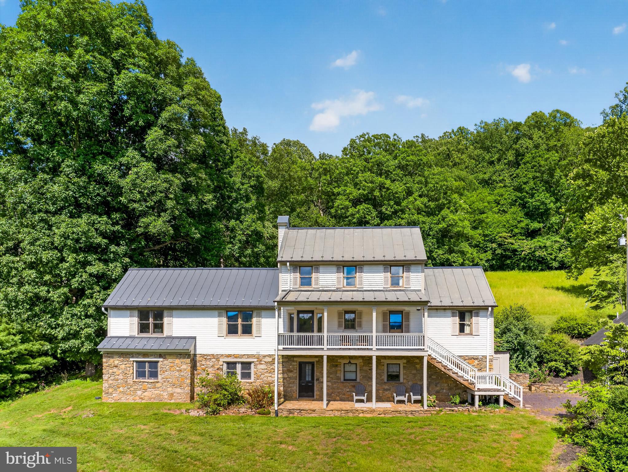 4028 South F T Valley Road Etlan, VA 22719 - Photo 74 of 101 front view of a house with a yard