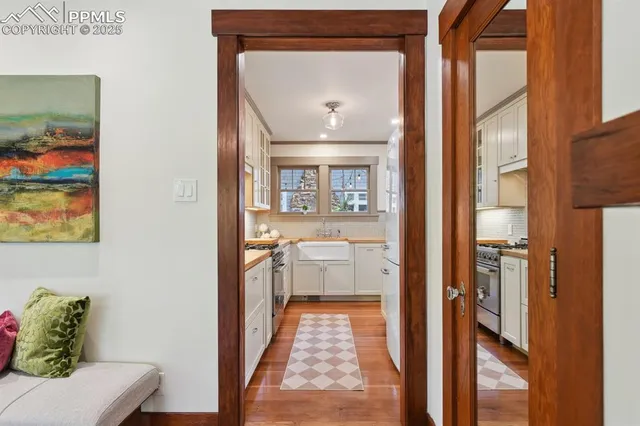 a very nice looking room with a large mirror and a mirror