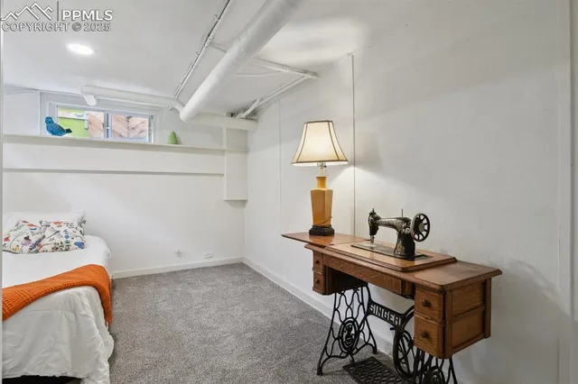 a room with furniture and wooden floor