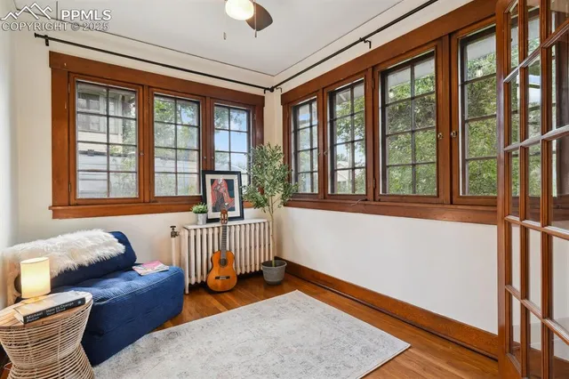 a living room with furniture and a window
